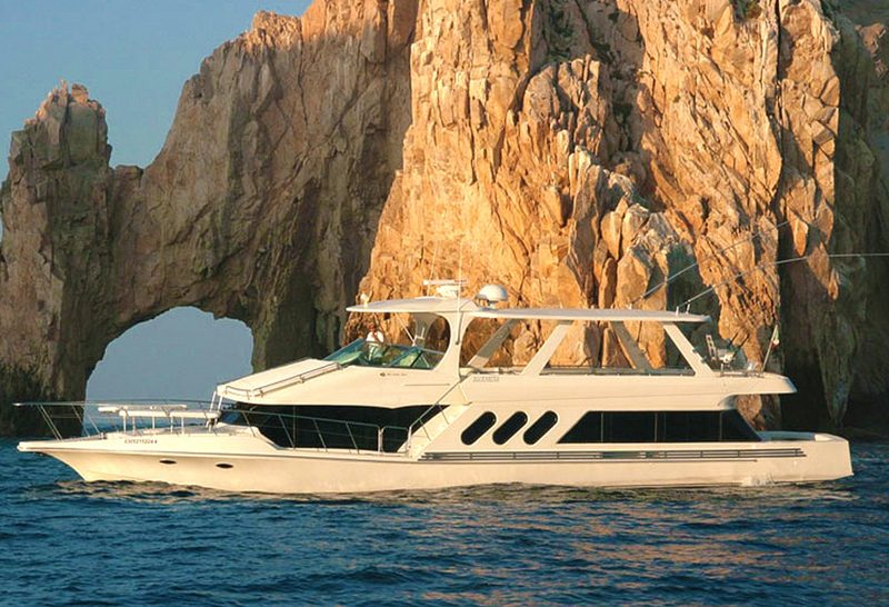 72-foot Bluewater yacht in front of El Arco at Land's End