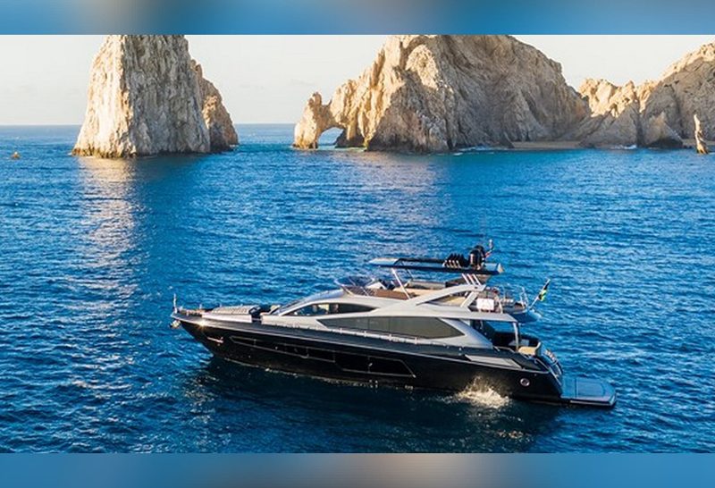 80-foot Sunseeker yacht cruising near the rocks of Land's End