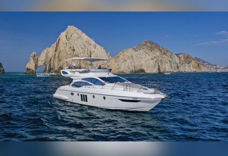 50-foot Azimut flybridge yacht near the rocks of Land's End